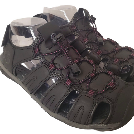 Khombu Women’s Ashley Sport sandals worn near a stream in Lake Mary

