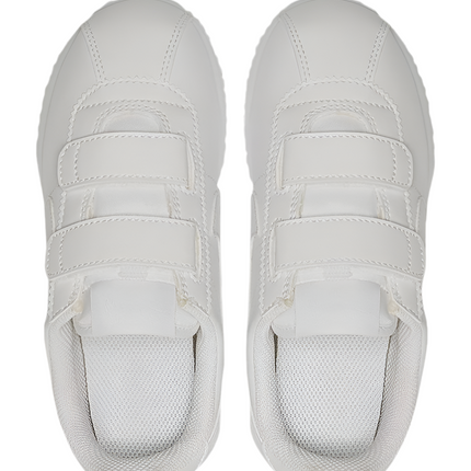 Lifestyle image of child wearing Nike Cortez Basic SL PSV