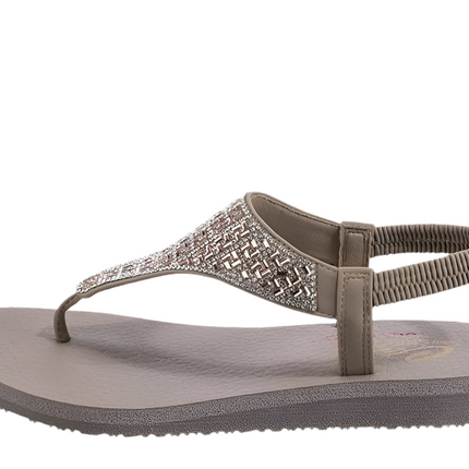 Skechers Meditation-Sweet Rock sandals worn on a beach day