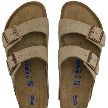 Birkenstock Arizona suede walking through city streets

