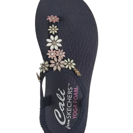Skechers Cali Meditation Happy Daisies Sandals worn on a beach day in Sanford

