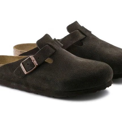 side view of birkenstock leather clog showing cushioned cork sole and soft suede upper