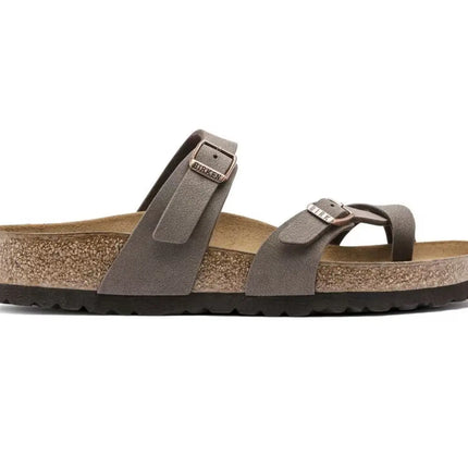 birkenstock casual sandals styled on light background with adjustable buckles and feminine silhouette

