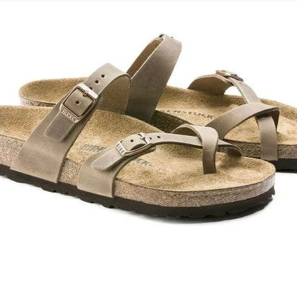 Top view of birkenstock mayari leather sandal with cross strap and toe loop in tabacco brown
