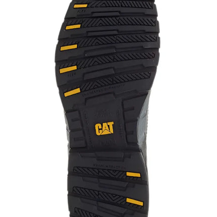 pair of cat work shoes displayed on warehouse floor with durable black leather uppers

