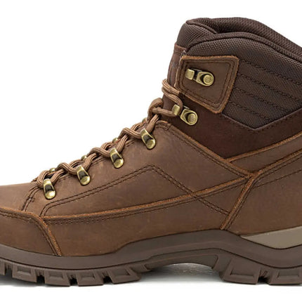 side view of caterpillar hiking work boots for men in muddy jobsite setting
