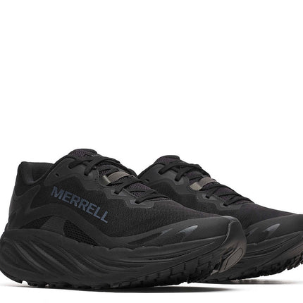 Man running on trail wearing Merrell ProMorph shoes
