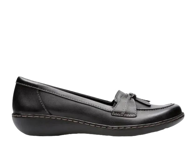Black loafer shoe on a white background