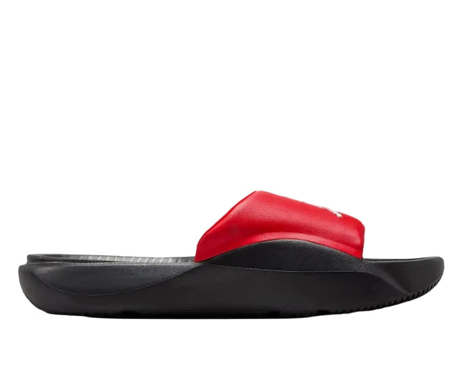 The NIKE FRANCHISE SLIDE by NIKE features a thick, contoured black foam sole and a wide red strap. Shown in side profile on a white background, these sandals offer support and style.