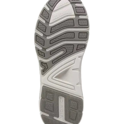 The image shows the sole of VIONIC WALK MAX KNIT – MEN’S SNEAKERS with a gray and white tread, segmented grooves, textured grip, and the VIONIC logo near the heel—renowned for arch support and comfort.