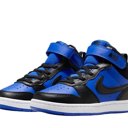 Pair of blue and black high-top sneakers on a white background