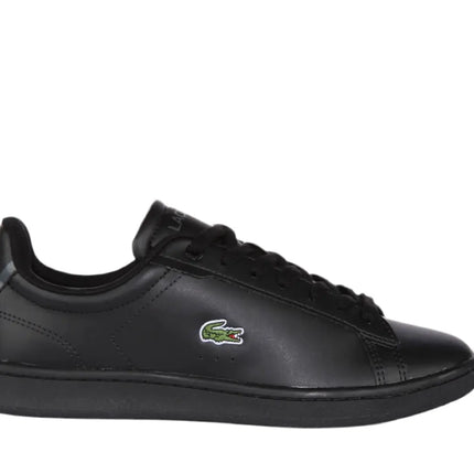 lacoste carnaby black sneakers styled with jeans and a casual jacket