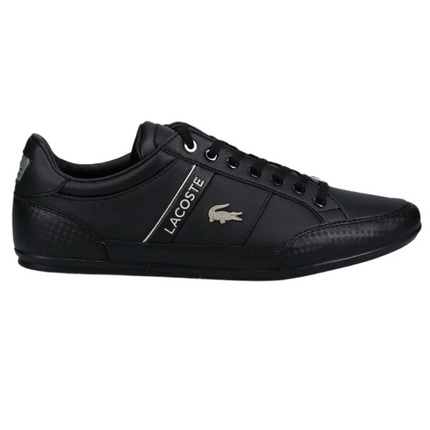 lacoste chaymon black leather sneakers styled with chinos in Orlando’s business district