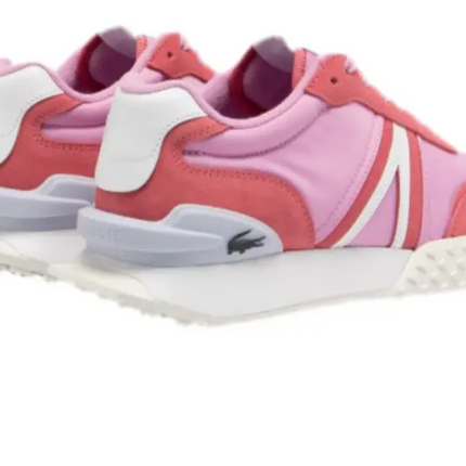close-up of lacoste l spin deluxe 124 sneakers resting on a shaded bench in St. Petersburg, Florida