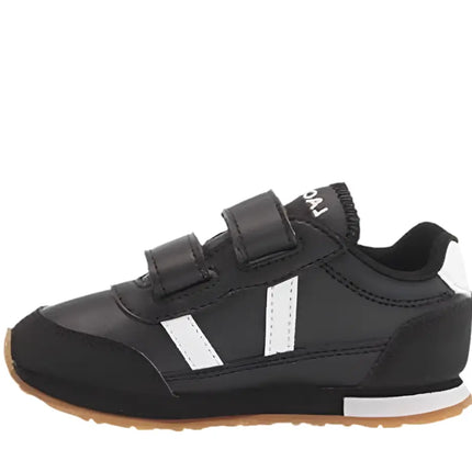 side view of lacoste men's partner piste sneaker in black on pavement