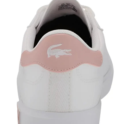 lacoste powercourt 0721 sneakers photographed against modern city backdrop