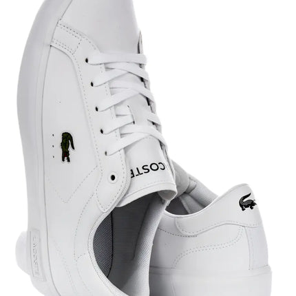 lacoste sneakers powercourt edition resting on white background beside accessories