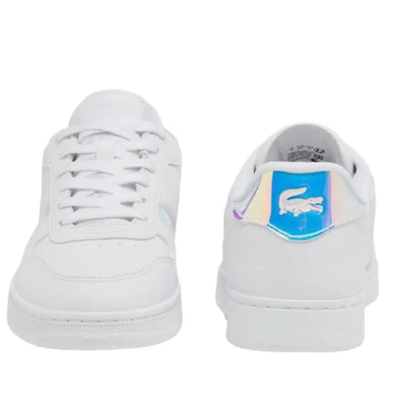 lacoste t clip on feet paired with cuffed jeans in urban street setting