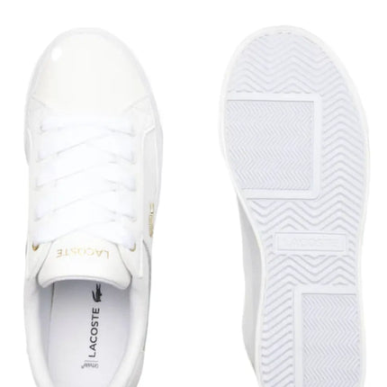 lacoste ziane black sneakers paired with white trousers during a casual stroll in downtown Savannah, Georgia