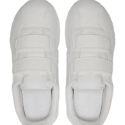 Lifestyle image of child wearing Nike Cortez Basic SL PSV