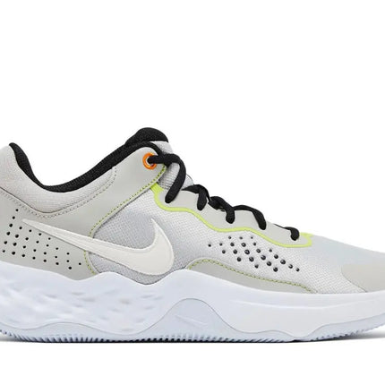 Nike Fly.By Mid3 displayed with ball on basketball court

