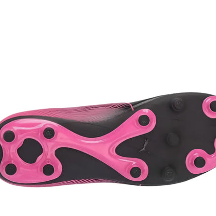 Side view of junior PUMA cleats designed for firm ground in Florida